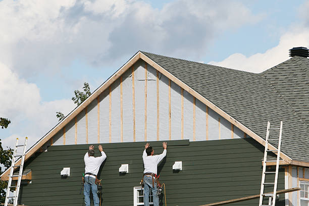 Professional Emergency Siding Repair technician working in Brunswick, NC